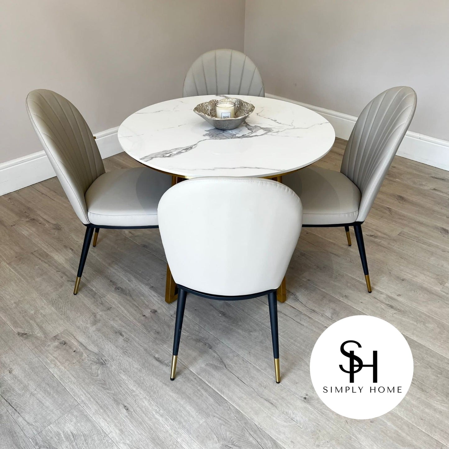Julio Circular White Marble Dining table with Beige Edra Dining Chairs