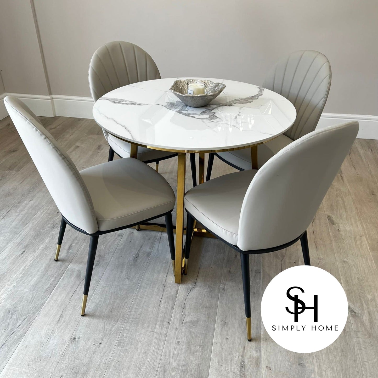 Julio Circular White Marble Dining table with Beige Edra Dining Chairs