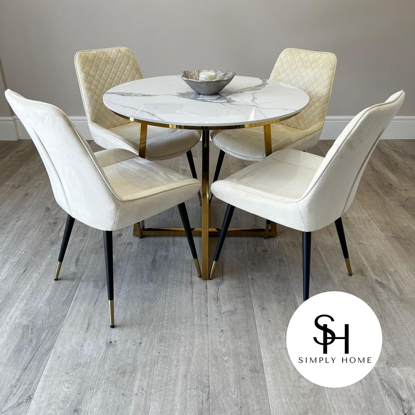Julio Circular White Marble Dining table with Cream Milano Dining Chairs