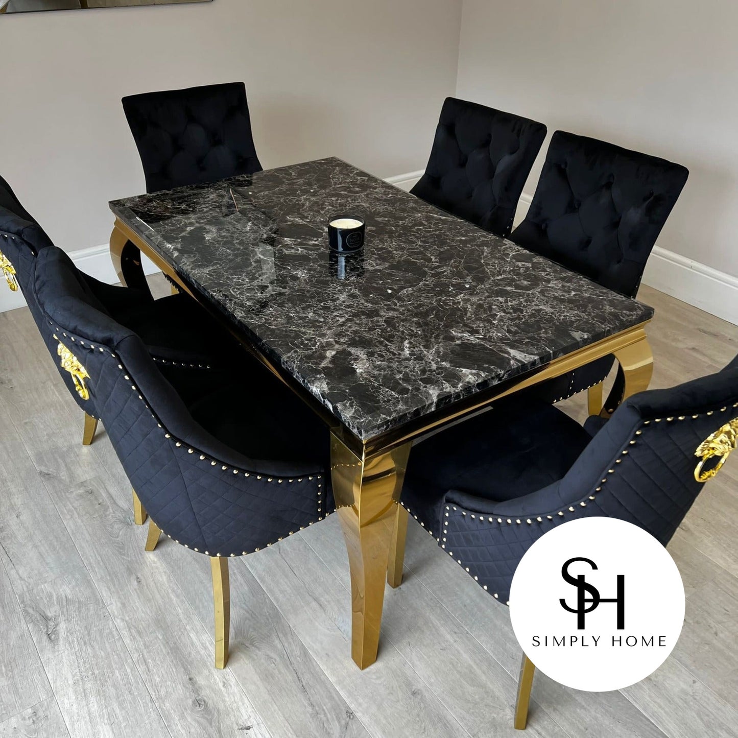 Riviera Gold Black Marble Dining Table with Black and Gold Leo Chairs