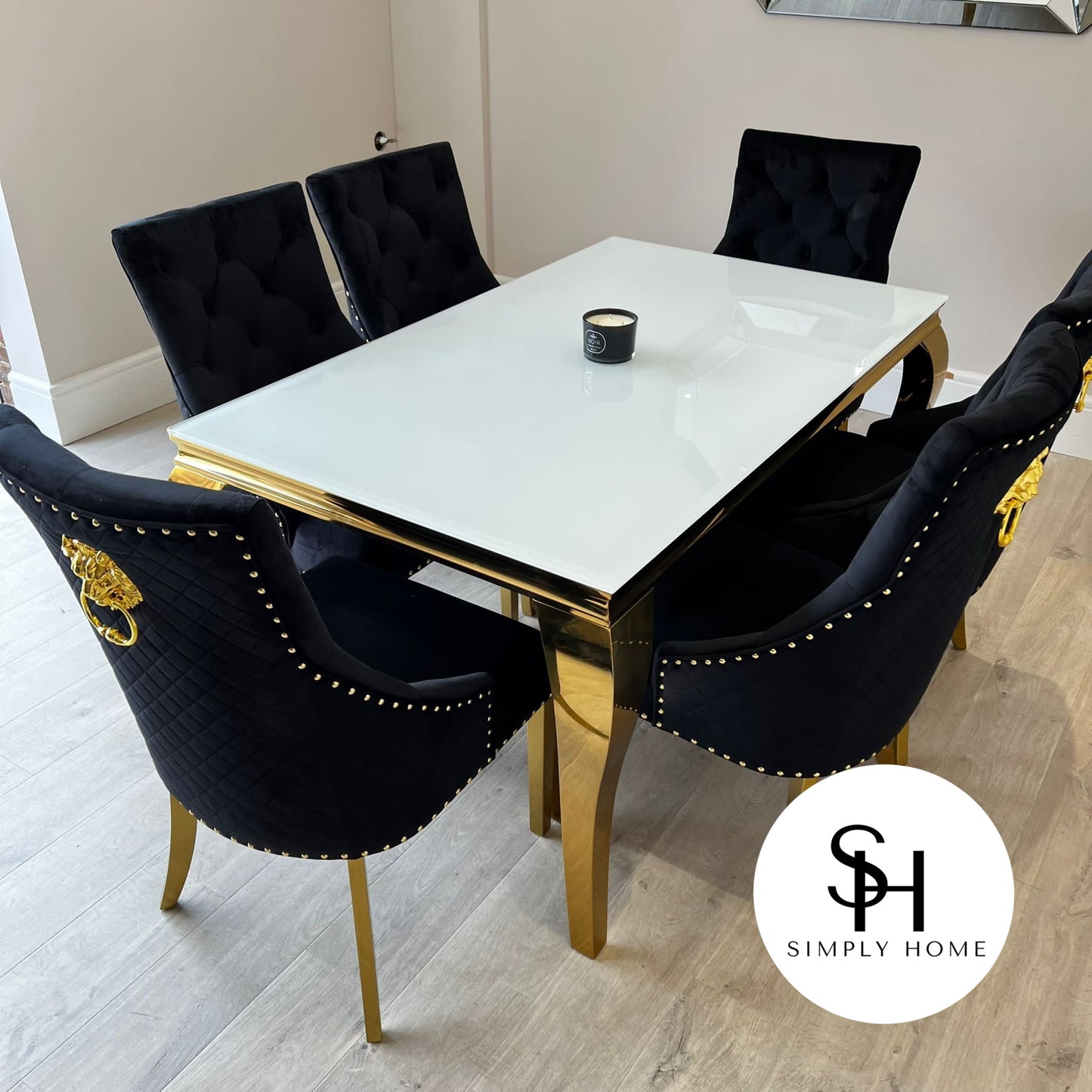 Riviera Gold White Glass Dining Table with Black and Gold Leo Chairs