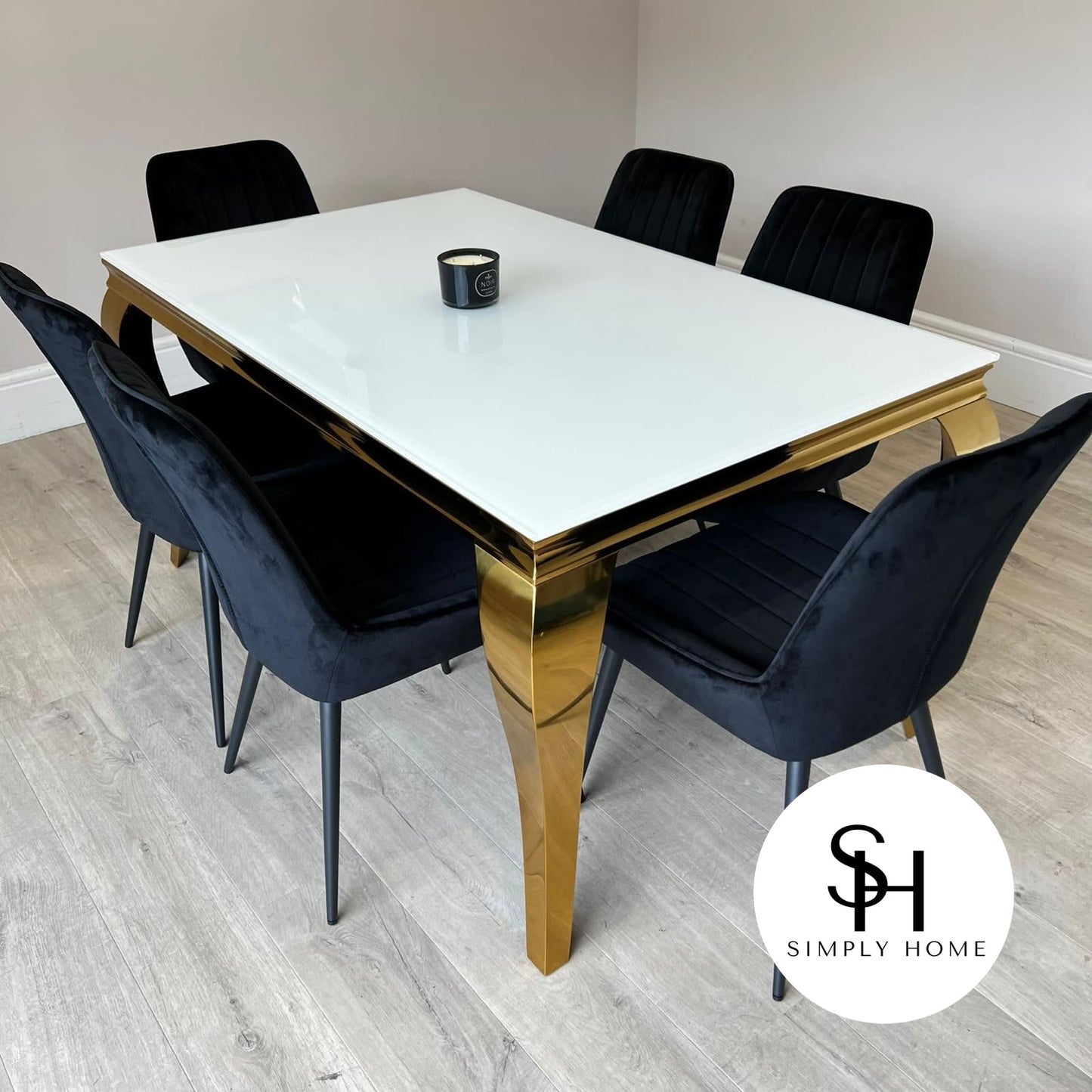 Riviera Gold White Glass Dining Table with Black Luca Chairs