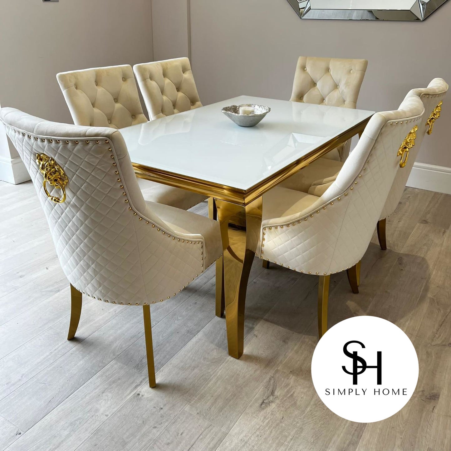 Riviera Gold White Glass Dining Table with Cream and Gold Leo Chairs