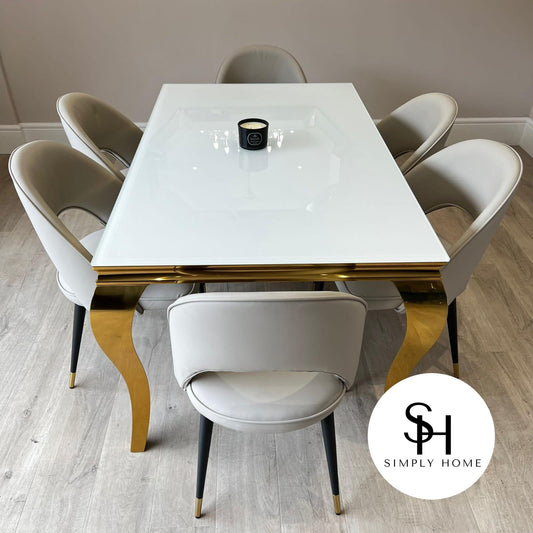 Riviera Gold White Glass Dining Table with Grey Adrianna Chairs