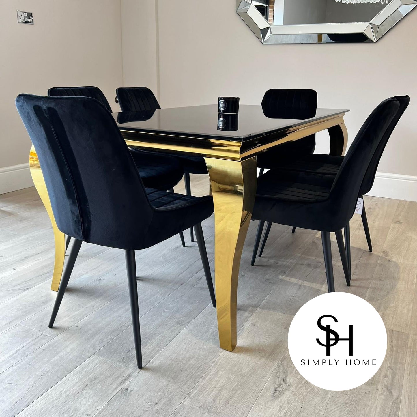 Riviera Gold Black Glass Dining Table with Black Luca Chairs