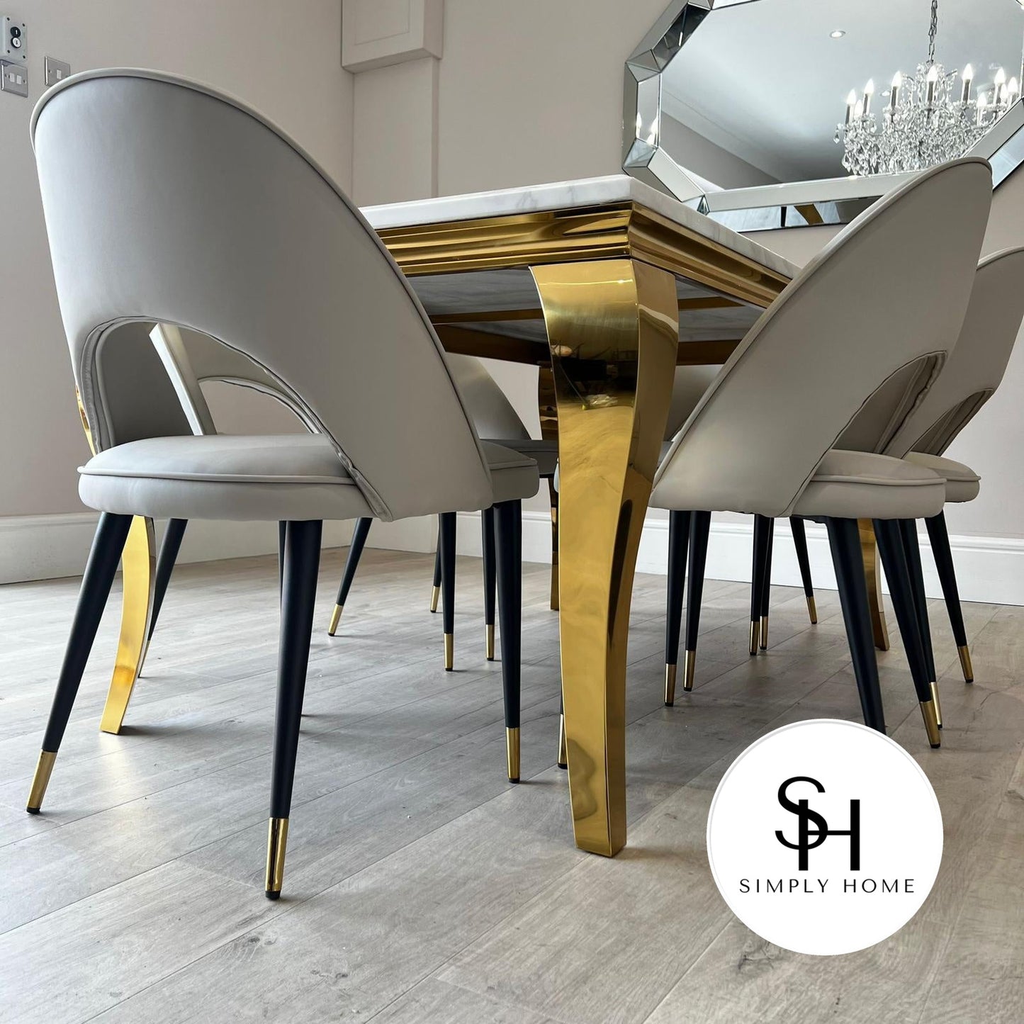 Riviera Gold White Marble Dining Table with Grey Adrianna Chairs