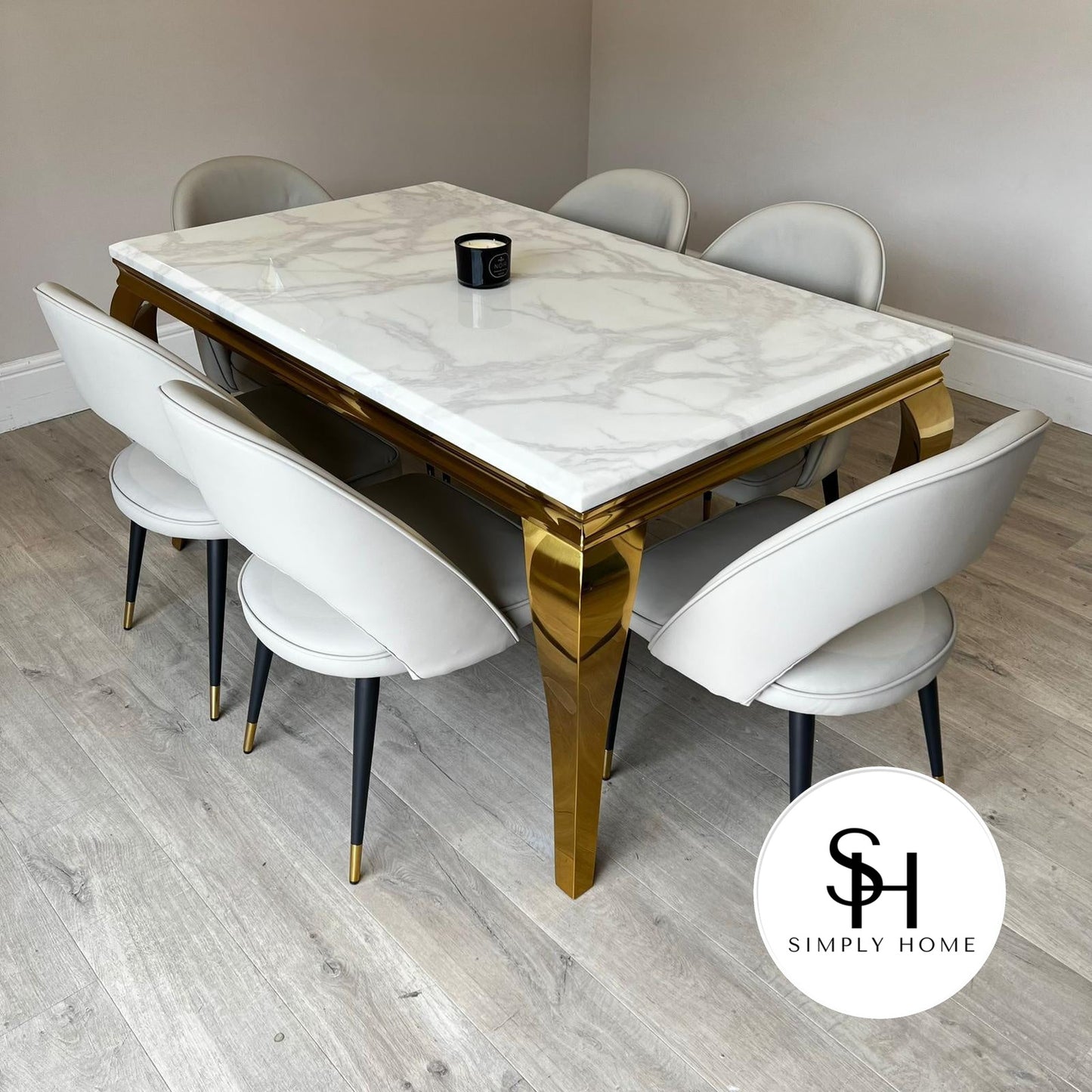 Riviera Gold White Marble Dining Table with Grey Adrianna Chairs
