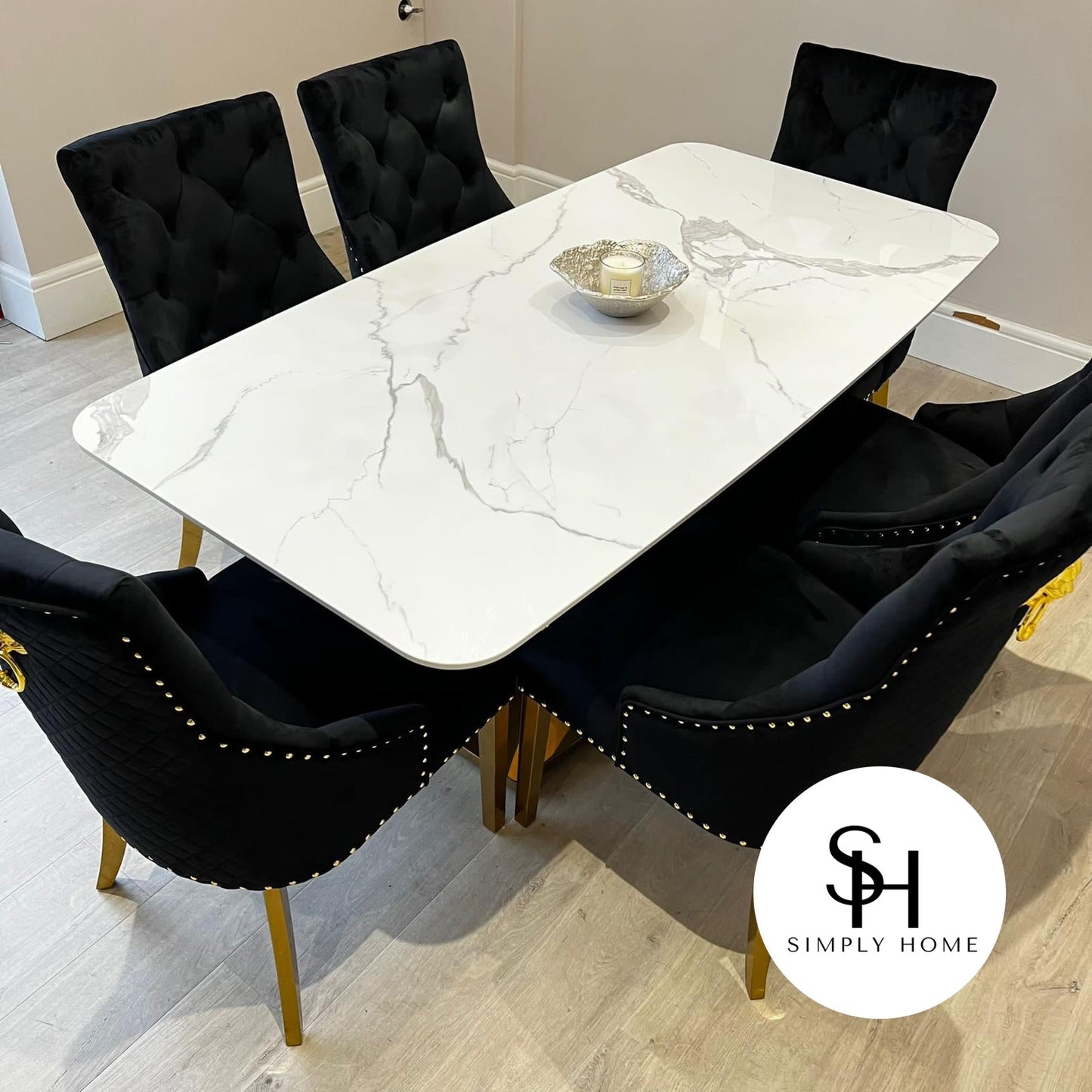 Vitorio White Marble Dining Table with Black Leo Gold Chairs